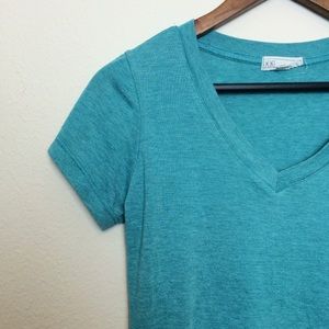 Light teal V-neck top