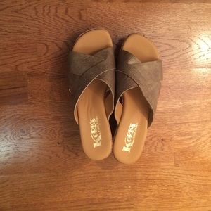 Korks wedge sandals.