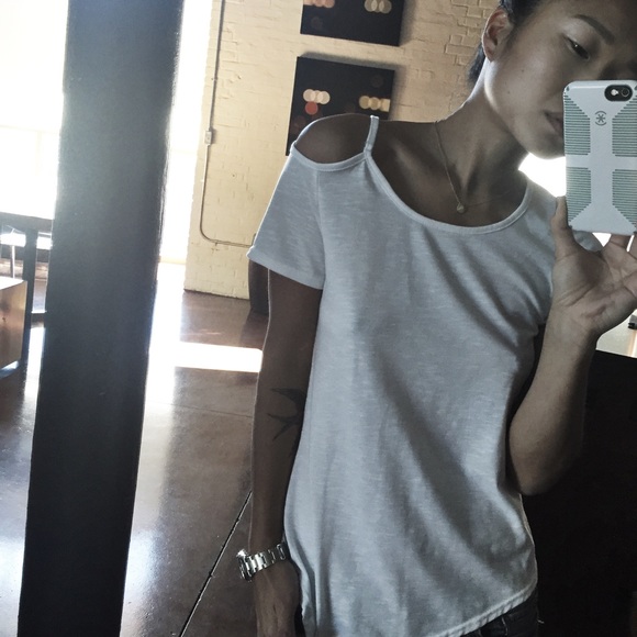 Cutout asymmetric tee