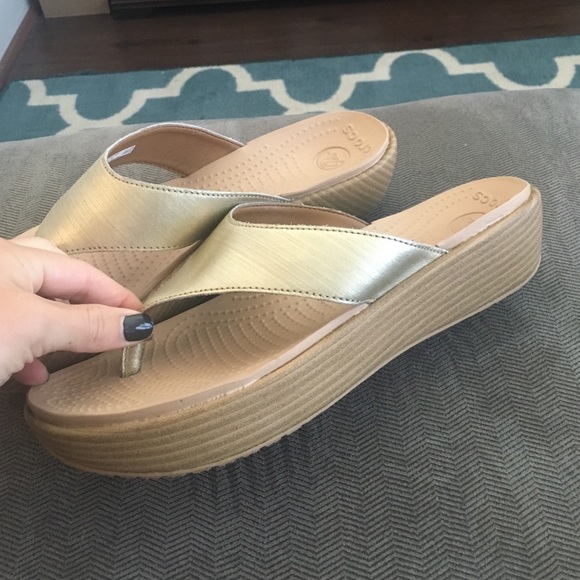 Gold crocs flip flops! Great condition!