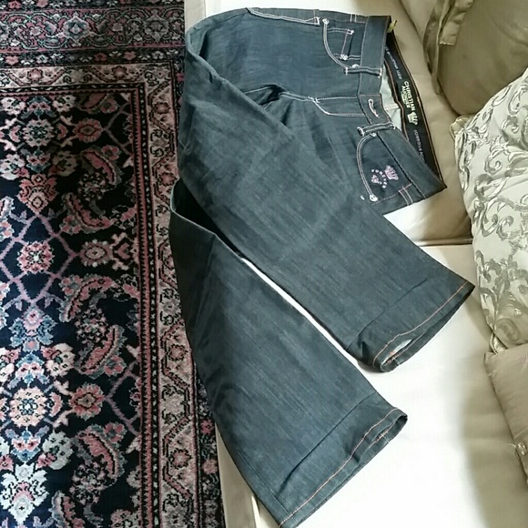 NEW WITH OUT TAGS Dark jeans with bronz stiching