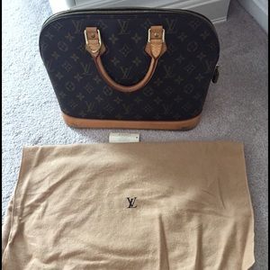 Louis Vuitton hand bag.