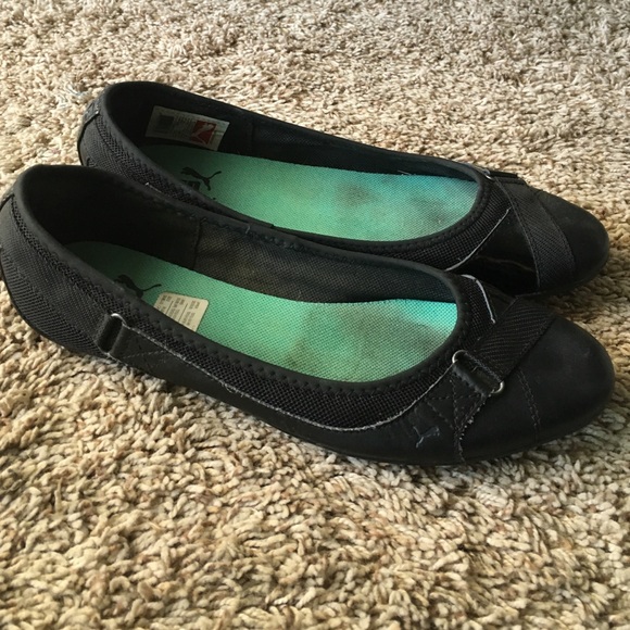 Black Puma flats