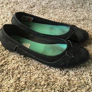 Black Puma flats