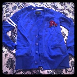 Cardigan with 'A' patch