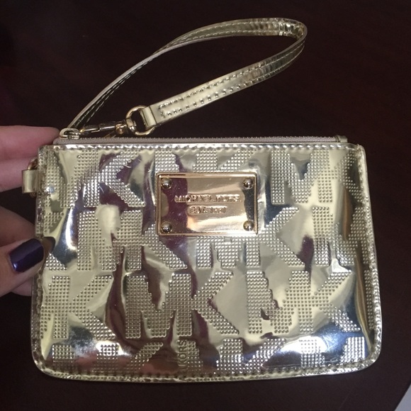 MK metallic gold wristlet