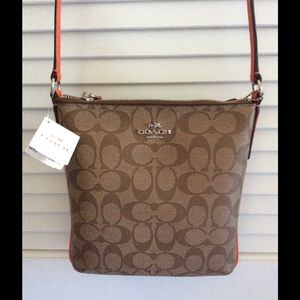 COACH Signature NS Cross body Purse