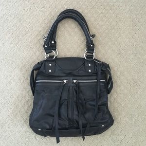 Black leather bag with zippers