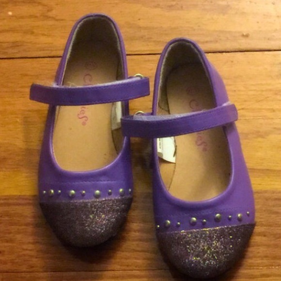 Purple "Mary Janes" with multi color sparkle tip.