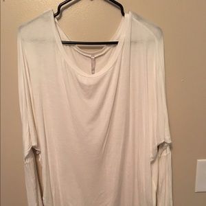 Plain white dolman shirt.