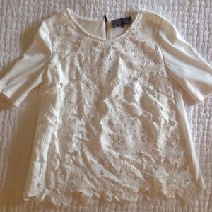White shirt sleeve laser cut flower top