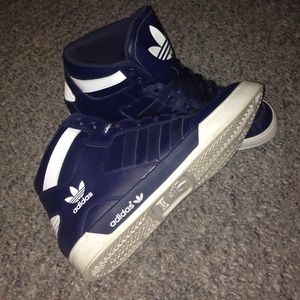 Navy blue hard court high top adidas