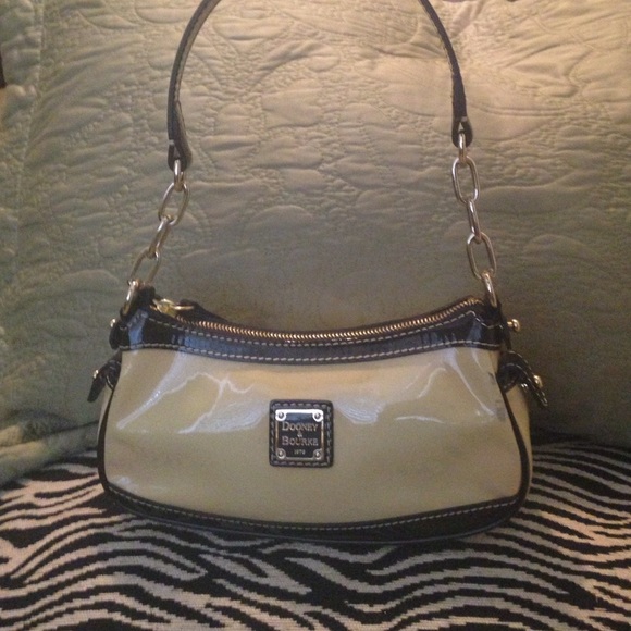 Dooney & Bourke Handbags - Dooney and Burke cream/black patent leather bag