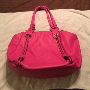Gorgeous pink leather bag with great detail!