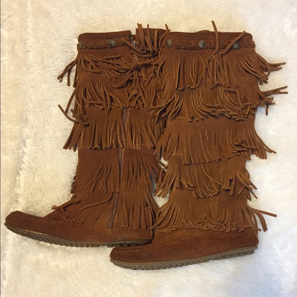 Minnetonka moccasins fringe boots.