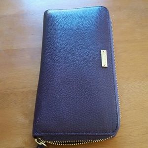 Kate Spade zip around wallet, purple leather