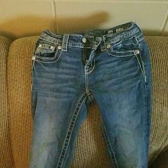 Boot cut mid rise miss me jeans