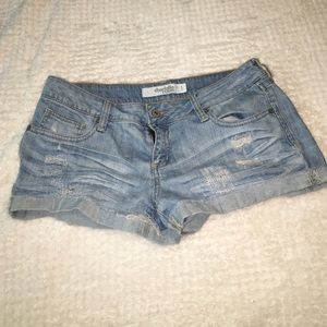 Distressed denim shorts