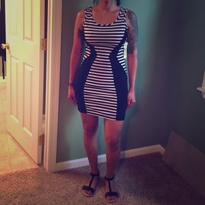 Black and white striped mini. Tight fitting.