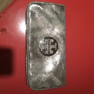Metallic silver Tory Burch clutch with suede