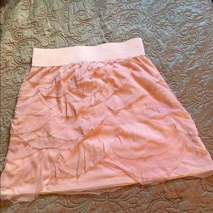 Pink mini skirt.