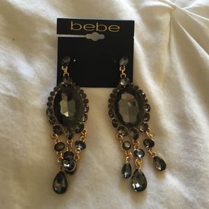 bebe earrings never been worn