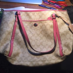 Pink and Beige coach purse
