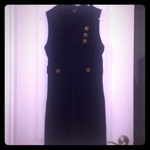 Navy blue dress with gold buttons and pockets