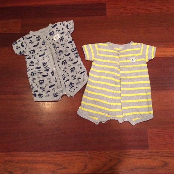 2 Carter's 12 month rompers. In great condition.
