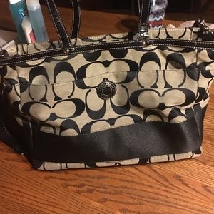 Black and grey coach diaper bag