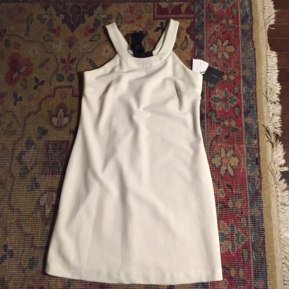 Zara Dresses & Skirts - Zara white dress with open back and black bow
