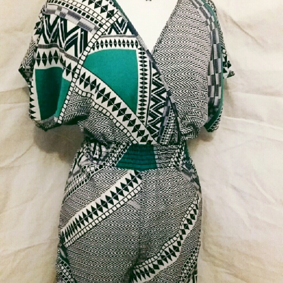 BLACK BRAD JUMPSUIT SIZE S.