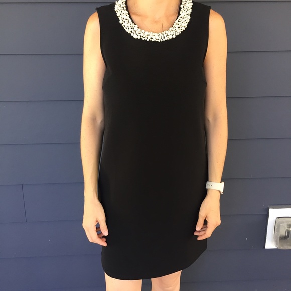 Black pearl collar dress.