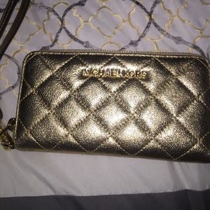 Gold Michael Kors wristlet