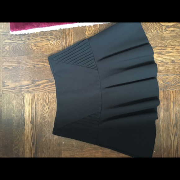 Black flouncy Parker skirt with ribbed side panels