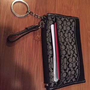 Coach change pouch with slot for cards