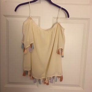 cream off the shoulder top with colored tassels