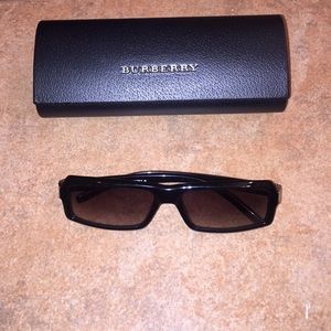 Burberry sunglasses and case.