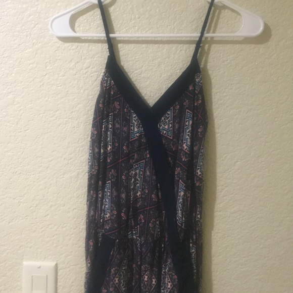A colorful romper. Never worn