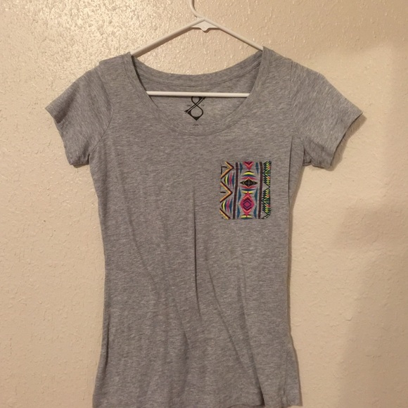 Grey tee with tribal printed pocket :)