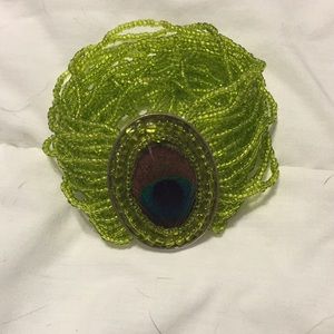 Beaded faux peacock bracelet