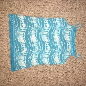 A blue and white tie die tank top