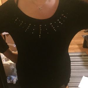 Black studded zipper back quarter sleeve shirt.