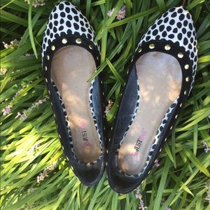 Animal print flats with gold studs.
