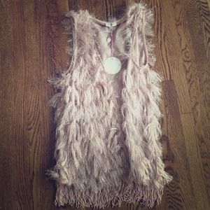 Pink fringe vest