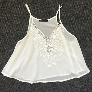 White Brandy Melville tank with cutout detail