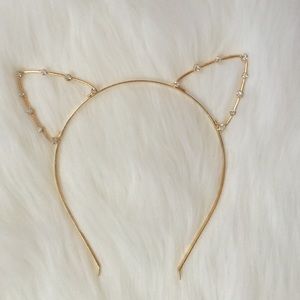 Cat ears headband with rhinestones.