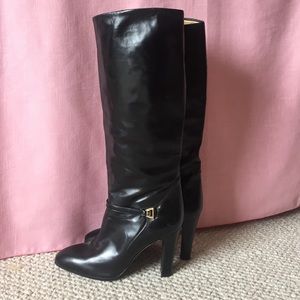 Size 40B smooth black leather Gucci boots.