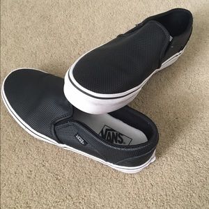 Vans black slip ons