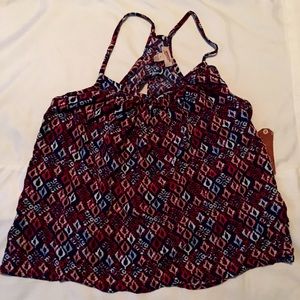 Cute tank top with flow open back NWT